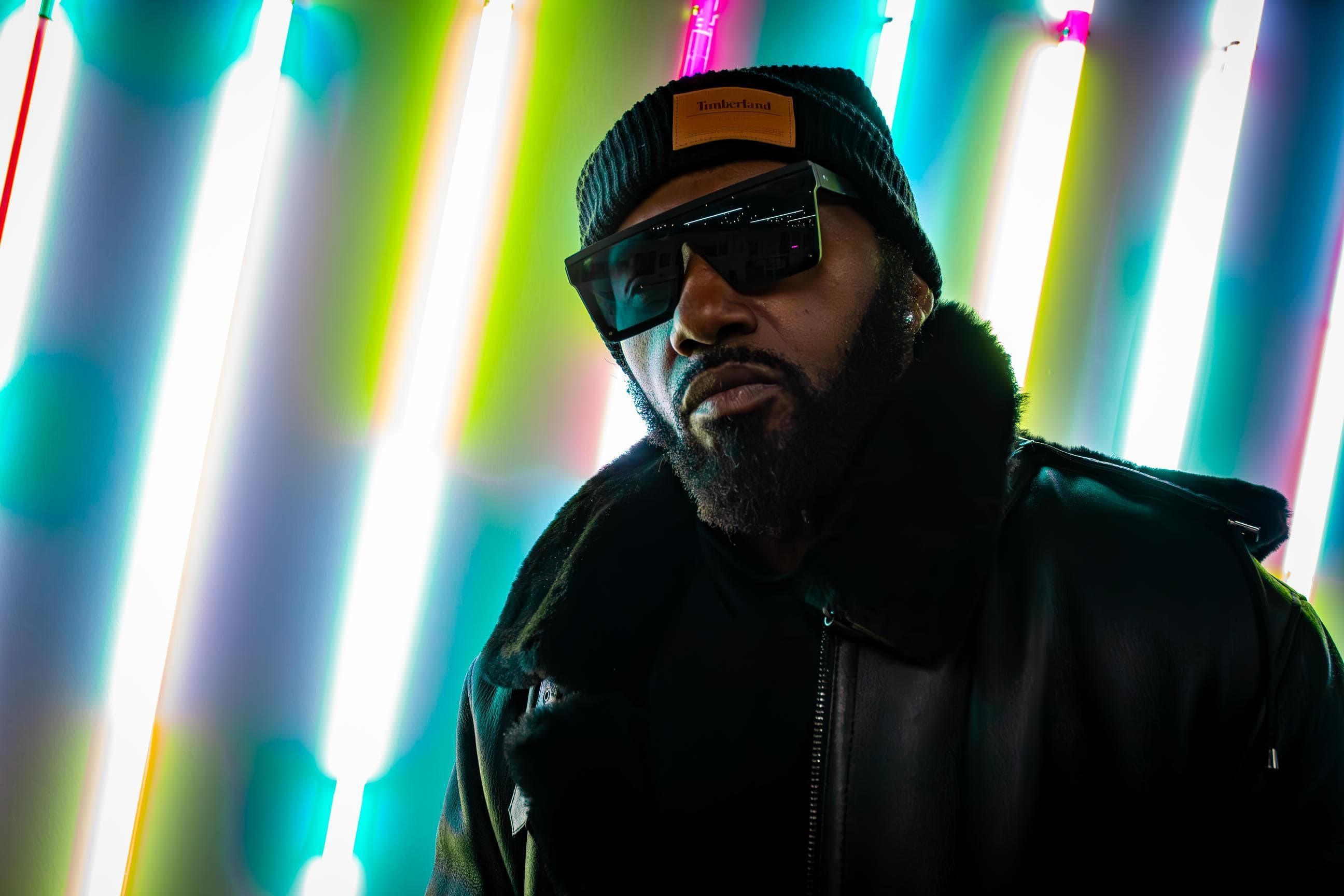 Mike the Chosen lit by neon